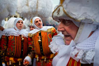 Binche festival carnival in Belgium Brussels. Belgium, carnaval of Binche. UNESCO World Heritage Parade Festival. Belgium, Walloon Municipality, province of Hainaut, village of Binche. The carnival of Binche is an event that takes place each year in the Belgian town of Binche during the Sunday, Monday, and Tuesday preceding Ash Wednesday. The carnival is the best known of several that take place in Belgium at the same time and has been proclaimed as a Masterpiece of the Oral and Intangible Heritage of Humanity listed by UNESCO. Its history dates back to approximately the 14th century.